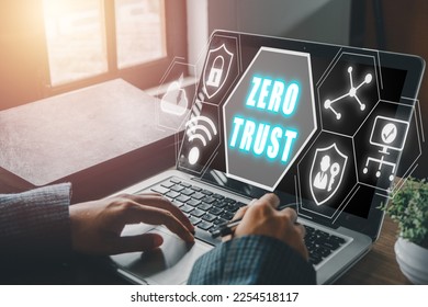 zero trust security concept, Person using computer with zero trust icon on virtual screen.