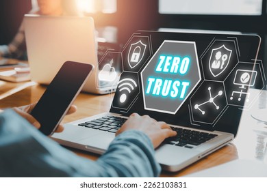 zero trust security concept, Person using computer with zero trust icon on virtual screen.