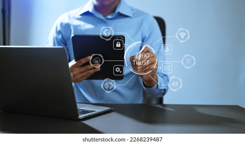 Zero trust security concept Person using computer and tablet with zero trust icon on virtual screen of Data businesses.in office