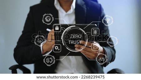 Zero trust security concept Person using computer and tablet with zero trust icon on virtual screen of Data businesses.

