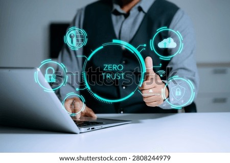 Zero trust security concept Person using computer and tablet with zero trust icon on virtual screen of Data businesses.in office