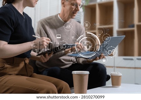 Zero trust security concept Person using computer and tablet with zero trust icon on virtual screen of Data businesses.in office.