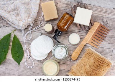 Zero Waste Bathroom Accessories, Natural Sisal Brush, Wooden Comb, Deodorant, Shea Butter, Solid Soap And Shampoo Bars, Reusable Cotton Make Up Removal Pads, Make Up Remover In A Glass Container. 