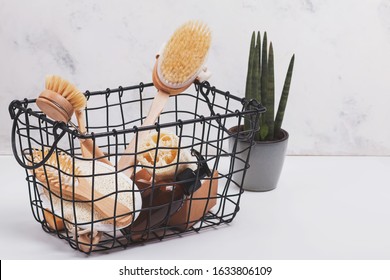 Zero Waste Bathroom Tools In Metal Basket. Wooden Brushes, Natural Soap And Other Items.