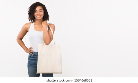 Zero Waste Concept. Black Woman With Eco Tote Bag Over White Studio Background. Panorama, Mockup, Copy Space