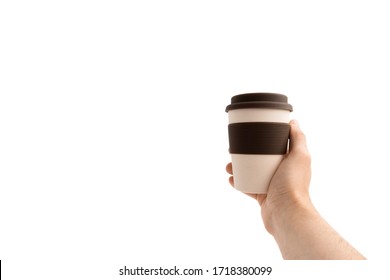 Zero Waste Concept. Hand Holding Stylish Reusable Eco Coffee Cup. Isolated On White.