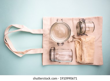 Zero waste conception, cotton bags and glass gars for free plastic shopping - Shutterstock ID 1910990671