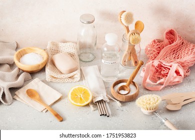 Zero Waste Eco Friendly Cleaning Kitchen Concept. Wooden Brushes, Lemon, Baking Soda, Vinegar, Drinking Straw