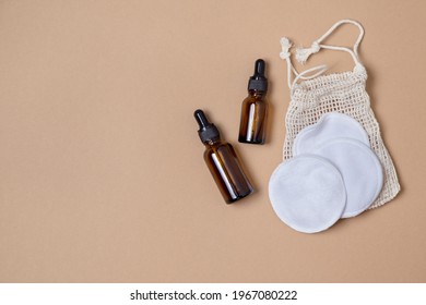 zero waste, eco-friendly lifestyle.  reusable cotton makeup remover wipes, reusable bottles on a beige background. view from above. - Shutterstock ID 1967080222