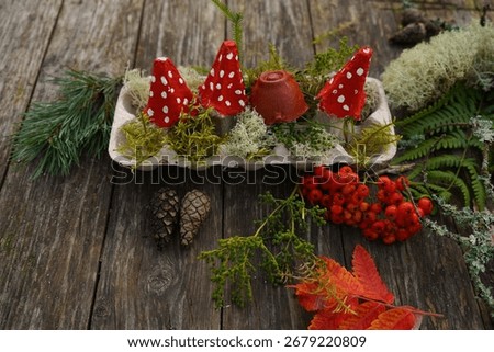 Zero waste fall project using natural and recycled materials to create a mushroom figure.