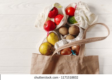 Zero Waste Food Shopping. Eco Natural Bags With Fruits And Vegetables In Tote, Eco Friendly, Flat Lay. Sustainable Lifestyle Concept. Plastic Free Items. Reuse, Reduce, Recycle, Refuse.