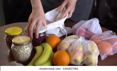 Zero Waste Grocery Shopping. Plastic Free Lifestale. Fabric Shopper Bag. Shop In Bulk. Low Waste. Housewife Uses Reusable Glass Containers And Cloth Bags To Buy Food