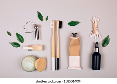 Zero waste self-care products. Bamboo toothbrush, toothpaste, tooth powder and flax. Flat lay style. - Shutterstock ID 1585014004