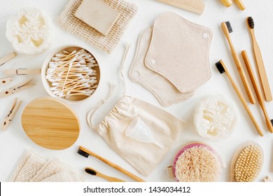 Zero waste supplies for personal hygiene. Eco Soap, bamboo toothbrush, reusable cloth menstrual pads, natural wooden brush. Sustainable lifestyle. Plastic free concept.