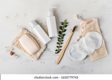 Zero Waste, Sustainable Bathroom And Lifestyle. Bamboo Toothbrush, Natural Soap, Cotton Make-up Removal Pads, Homemade DIY Beauty Products In Reusable Bottles.