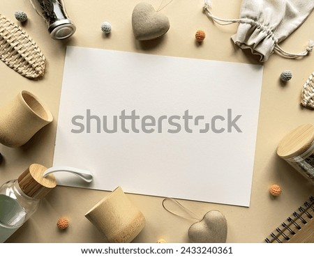 Zero waste tea background, various low impact alternatives to disposable objects in making tea. Frame on pale yellow paper background with copy-space.