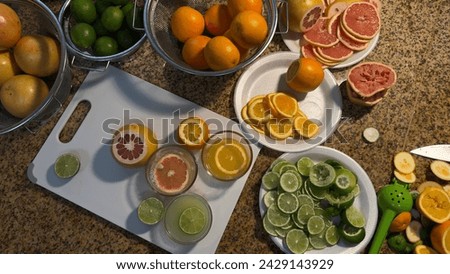 Zesty Harmony: Oranges, Grapefruits, and Lemons Beautifully Sliced in Chic Containers