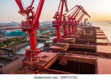 Zhangjiagang, Suzhou, Jiangsu, China - june 05,2021: Bulk carrier unloading iron ore in the chinese port Zhangjiagang.