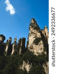 Zhangjiajie national forest park, China, Glass bridge of Zhangjiajie China Tianzishan with blue sky, concept of world heritage, avatar, heritage peak or cliff mountain, tourist attraction famous place