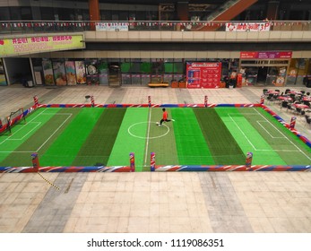 Zhongshan,China-June 23, 2018:boy Playing Soccer Inside A Shopping Mall In A Indoor Soccer Field.
