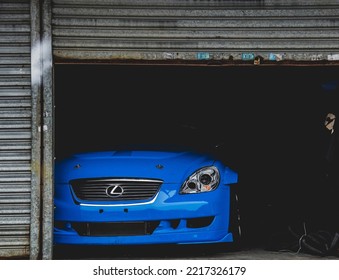 Zhuhai, China- October 18,2022: A Blue Lexus Sedan Is Parked In Garage