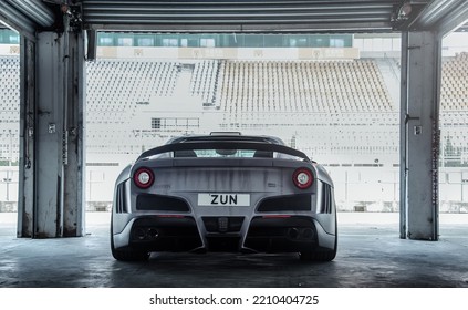 Zhuhai, China- October 2,2022: A White Ferrari Hypercar Is Parked In Garage
