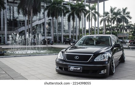 Zhuhai, China- October 8,2022: A Black Modified Lexus Sedan Is Parked In Courtyard