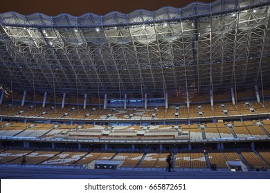 ZHUJIANG NEW TOWN, TIANHE DISTRICT,GUANGZHOU SHI, GUANGDONG, CHINA - APRIL 2017: Empty Grandstand Of Guangzhou's 2010 Asian Games Stadium On Haixinsha Island, At Night, Guangzhou China.