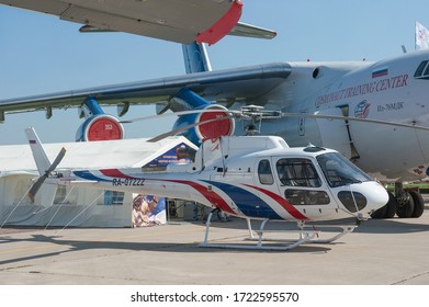 Zhukovsky, RUSSIA - August 29, 2019: Russian Eurocopter AS350 B3 helicopter number RA-07222 center operation of space infrastructure objects at the MAKS-2019 International aerospace salon, right view