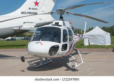 Zhukovsky, RUSSIA - August 29, 2019: Russian Eurocopter AS350 B3 helicopter number RA-07222 center operation of space infrastructure objects at the MAKS-2019 International aerospace salon, left view