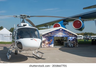 Zhukovsky, RUSSIA - August 29, 2019: Russian Eurocopter AS350 B3 helicopter number RA-07222 center operation of space infrastructure objects at the MAKS-2019 International aerosalon