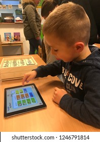 ZIERIKZEE, THE NETHERLANDS - NOVEMBER 13, 2018: The New Learning: Children Using An IPad For Learning Purposes In A Elementary School.