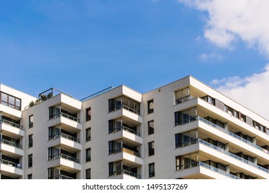 Zigzag condominium with corner balconies. Copy space above the building. - Powered by Shutterstock