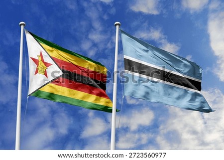 Zimbabwe and Botswana two flags textile cloth, fabric texture, union, peace, conflict and partnership concept. Zimbabwean and Motswana official national relationship symbols.