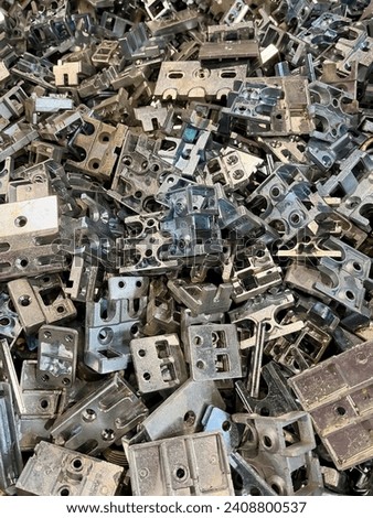 Zinc die cast window components waste from a manufacturing process