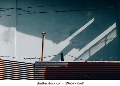 Zinc Enclosed As A Fence And Block Building.