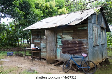 Zinc Sheet Metal And Wood Native House Architecture In Rural Jungle With Bicycle Corn Island Nicaragua Central America