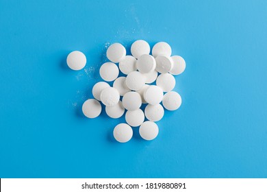 Zinc Tablets, Nutrition Supplement Pills On Blue Background