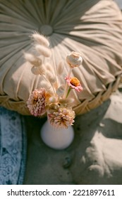 Zinnias And Dried Floral Arrangement On The Beach