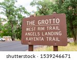 Zion National Park parking lot stop on road in Utah with sign for the grotto west rim, kayenta and Angel