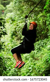 Zipline Scared Zip Line Adult Overweight Mature Lady On Zipline Trip Nearby Banos De Agua Santa Claus Ecuador Zipline Scared Zip Line Adult Tour Sport Canopi Emotion Frightened Vacation Vegetation Out