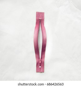 Zipper For Clothes In The Form Of Female Genital Organs