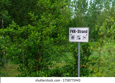 Zittau, Saxony/Germany - June 18th 2020: Signpost at Lake Olbersdorfer See marking the beginning of the nudist beach (FKK Strand)