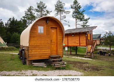 Zlatibor, Vodice, Serbia - July 26. 2020 Wooden House With Wheels Or A Wagon In The City Of El Paso In Wild West Style And Cowboy Style. Western Thematic Park. Travel Concept