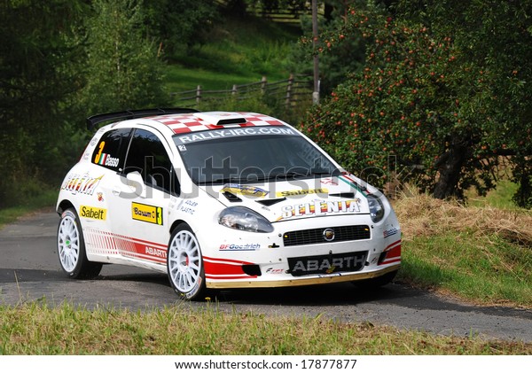 ZLIN,CZECH REP.-AUGUST 23.Driver\
G.BASSO and co-driver M.DOTTA with car Fiat Grande Punto at Barum\
Rally event,speed check Nr.2 August 23.2008 in Zlin,Czech\
republic.