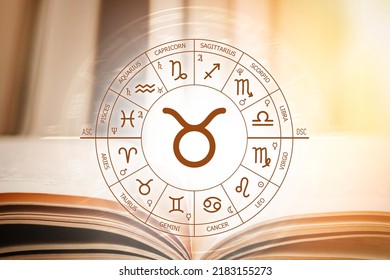 Zodiac circle against the background of an open book. Astrological forecast for the signs of the zodiac. Characteristics of the sign Taurus. Astrology, esotericism, secret science