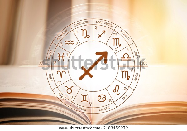 Zodiac\
circle against the background of an open book with Sagittarius\
sign. Astrological forecast for the signs of the zodiac.\
Characteristics of the sign Sagittarius.\
Astrology