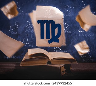 Zodiac sign Virgo on old paper flying above old astrology books. - Powered by Shutterstock