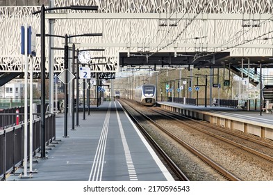 Zoetermeer, The Netherlands, January 30, 2022: two sprinter train approach and leave the Zoetermeer-Lansingerland railway station