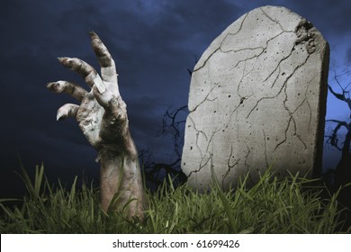 Zombie Hand Coming Out Of His Grave